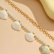 Chaine de taille coquillages et perles -Nérée Chevillère Bijoux