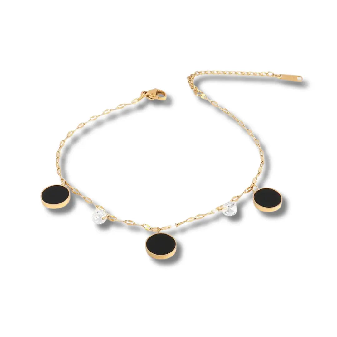 chainette-de-cheville-or-perles-noirs-diamants