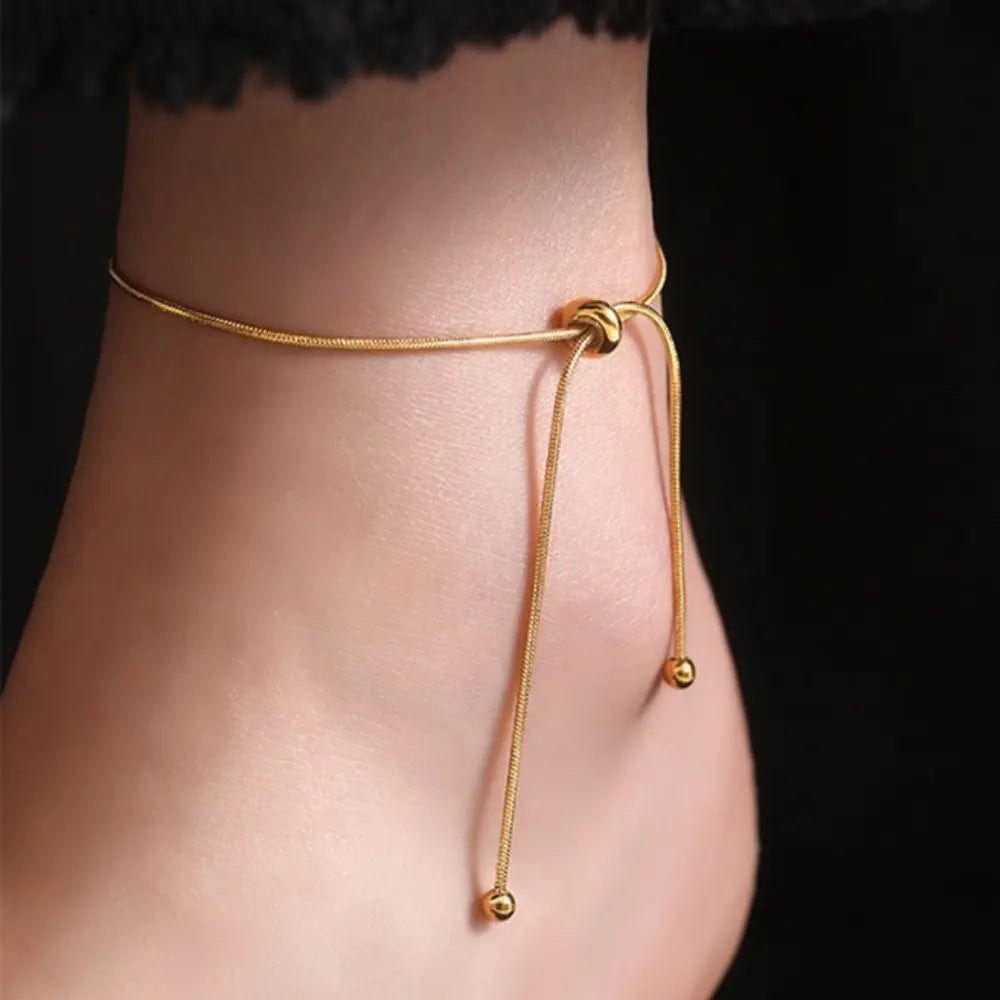 bracelet-de-cheville-or-ficelle